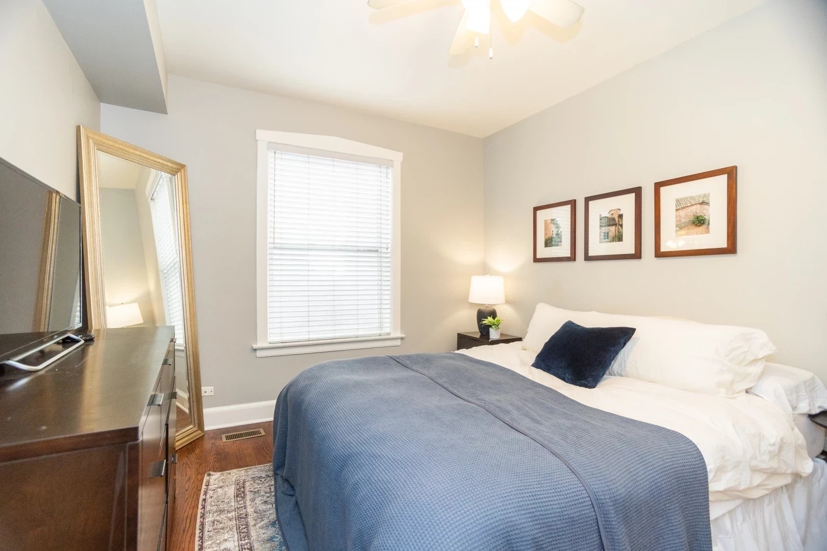 2026 North Burling Street, Unit 208 Chicago, IL 60614 - Photo 9 of 14 a bedroom with a bed and a window