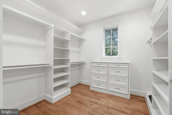a view of an empty walk in closet