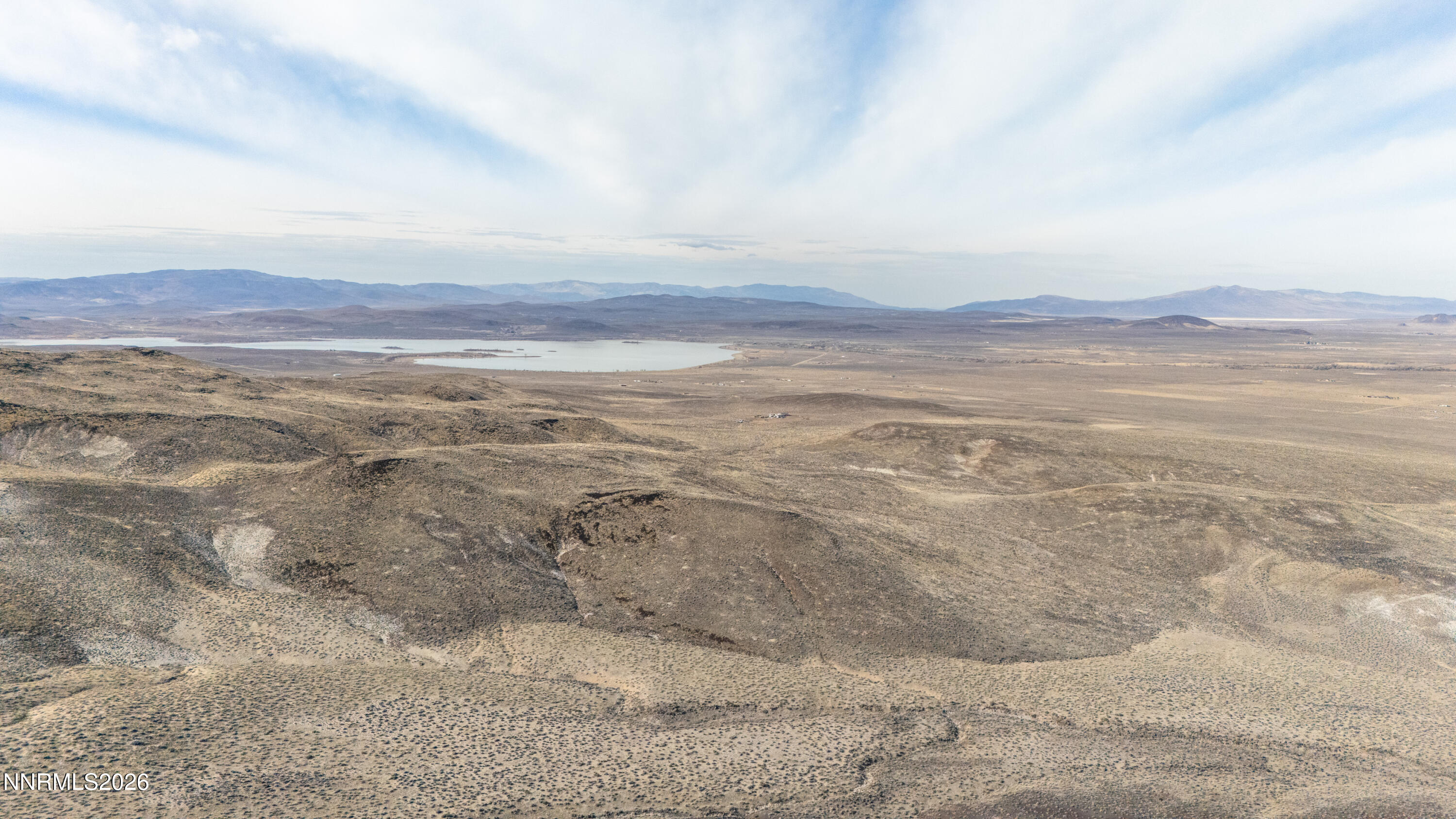 16642 Power Line Road Fallon, NV 89406 - Photo 9 of 54 a view of an ocean beach and mountain
