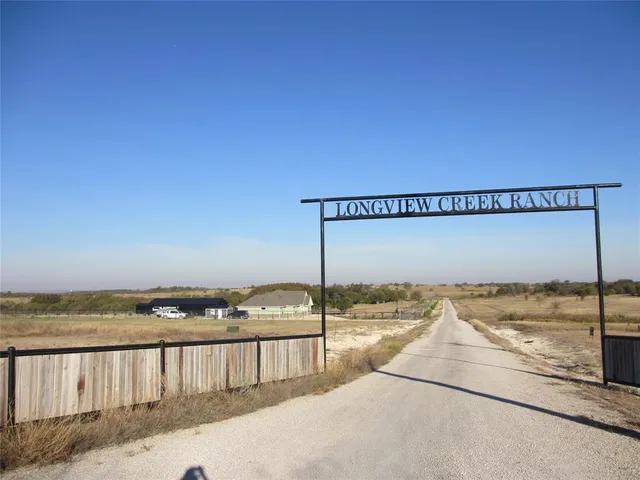 a view of a lake with a big yard