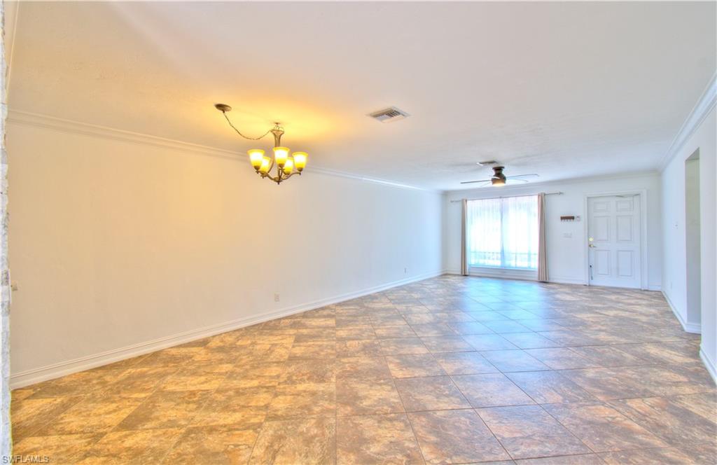 787 Palm View Drive, Unit 3 Naples, FL 34110 - Photo 6 of 27 a view of an empty room with a window