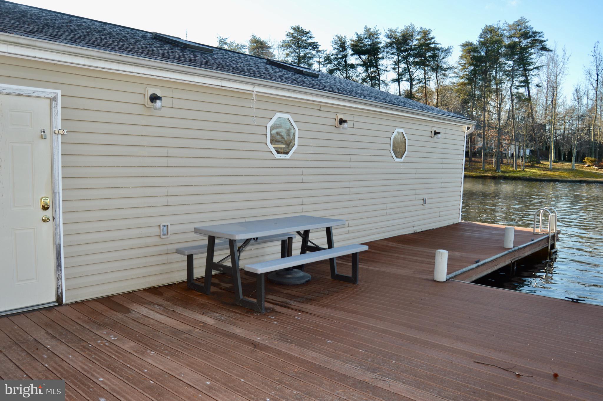 619 Oak Road Bumpass, VA 23024 - Photo 48 of 49 Deck at the boathouse