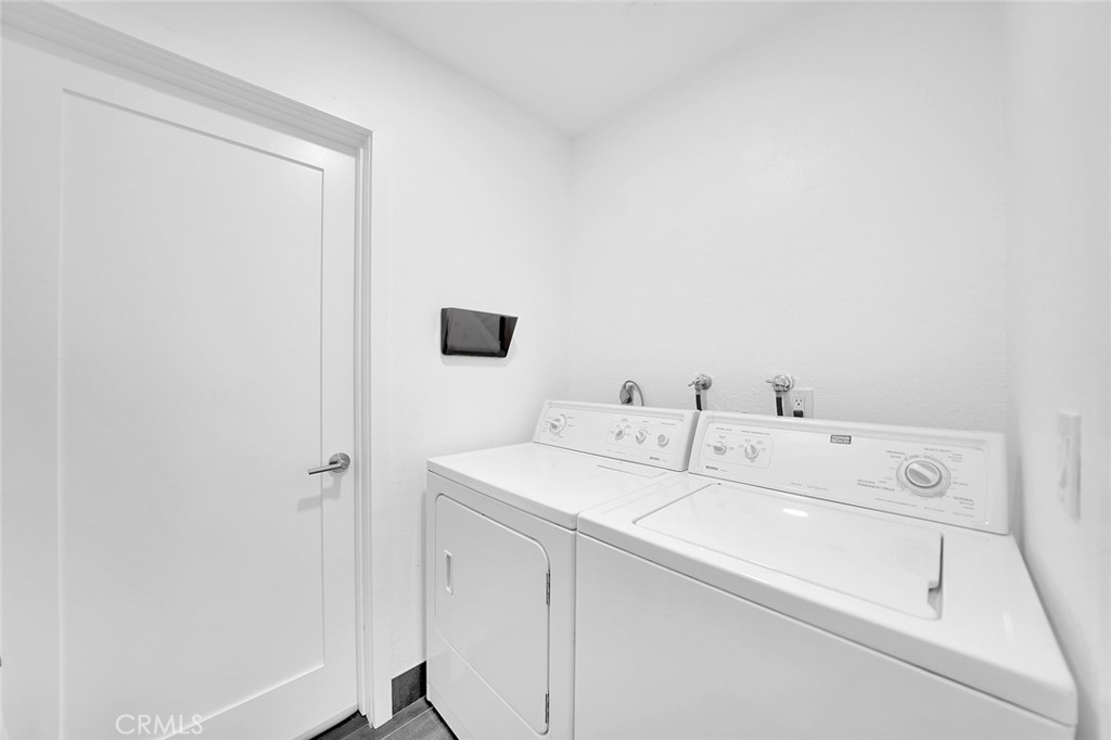 6301 Marina Pacifica Drive Long Beach, CA 90803 - Photo 21 of 39 a utility room with dryer and washer