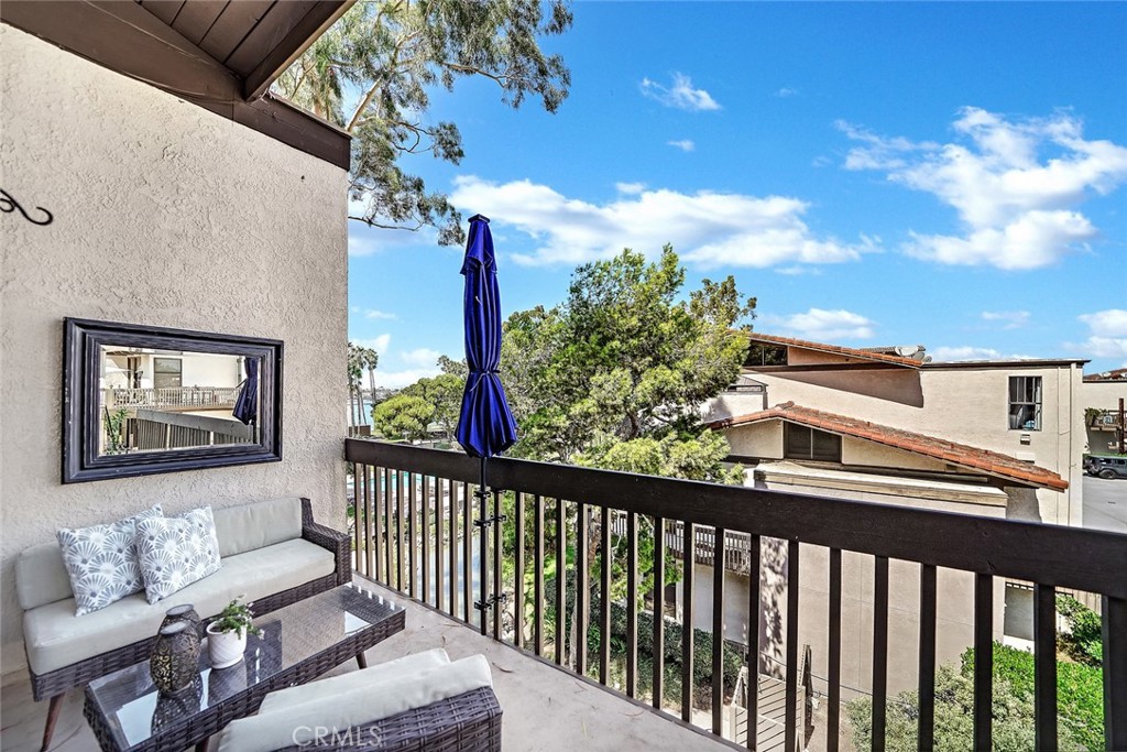 6301 Marina Pacifica Drive Long Beach, CA 90803 - Photo 25 of 39 a view of a balcony with furniture