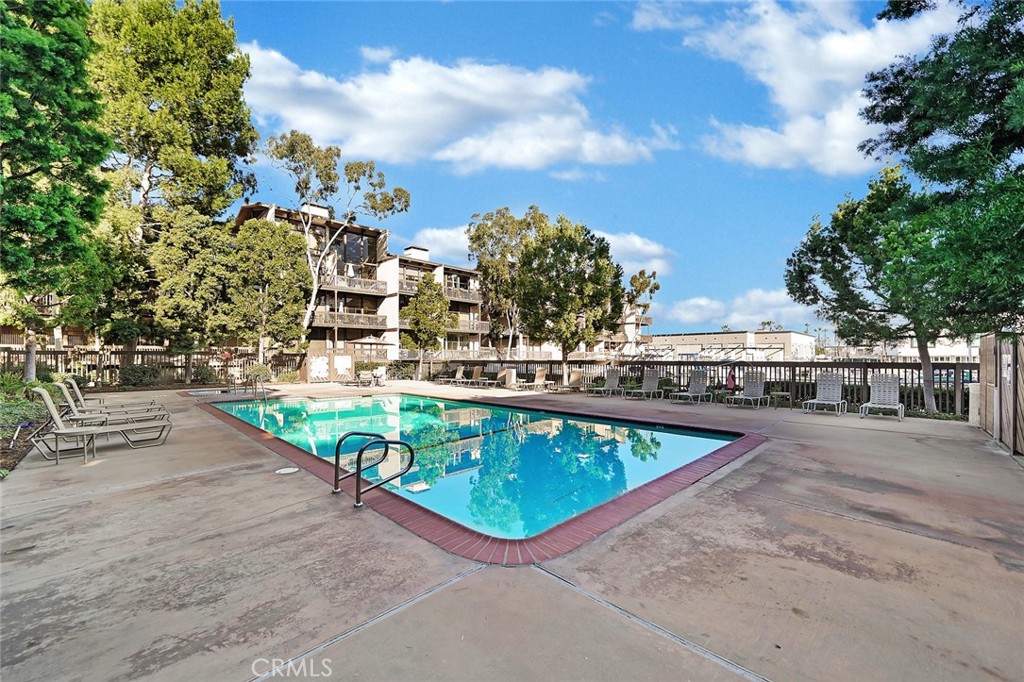 6301 Marina Pacifica Drive Long Beach, CA 90803 - Photo 30 of 39 a view of swimming pool with outdoor seating and city view