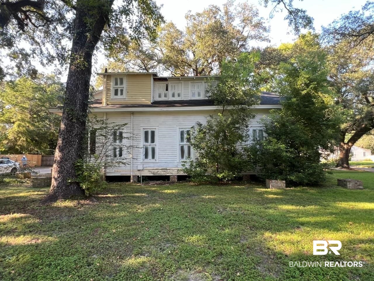 104 Mohawk Street Mobile, AL 36606 - Photo 4 of 12 Rear view of property with a lawn