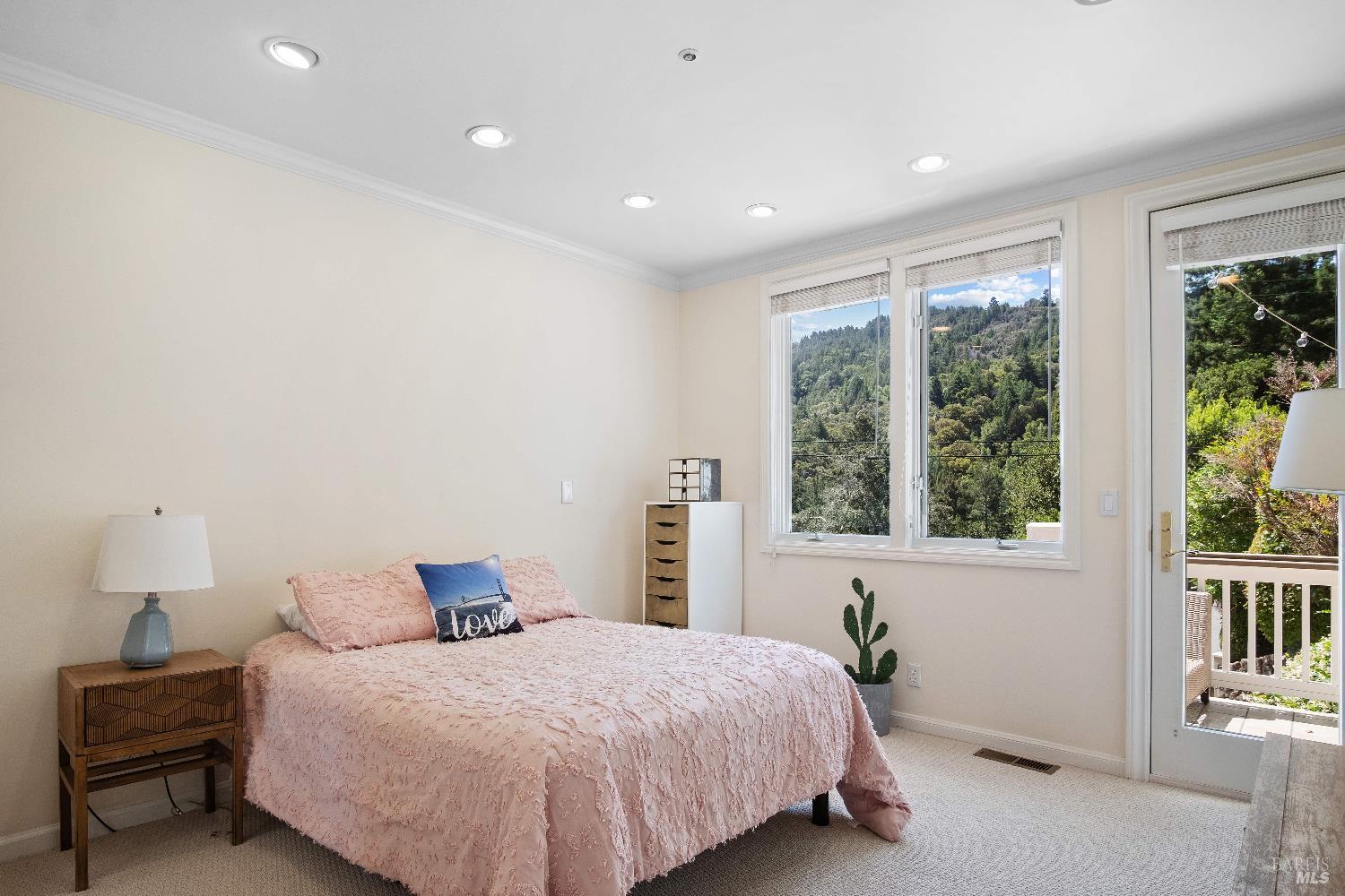 6 Oak Road Larkspur, CA 94939 - Photo 24 of 41 a bedroom with a bed and a window