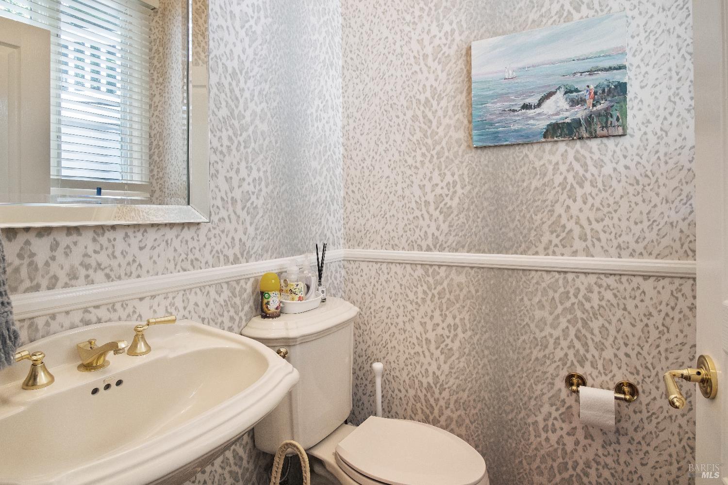 6 Oak Road Larkspur, CA 94939 - Photo 26 of 41 a bathroom with a sink mirror and toilet