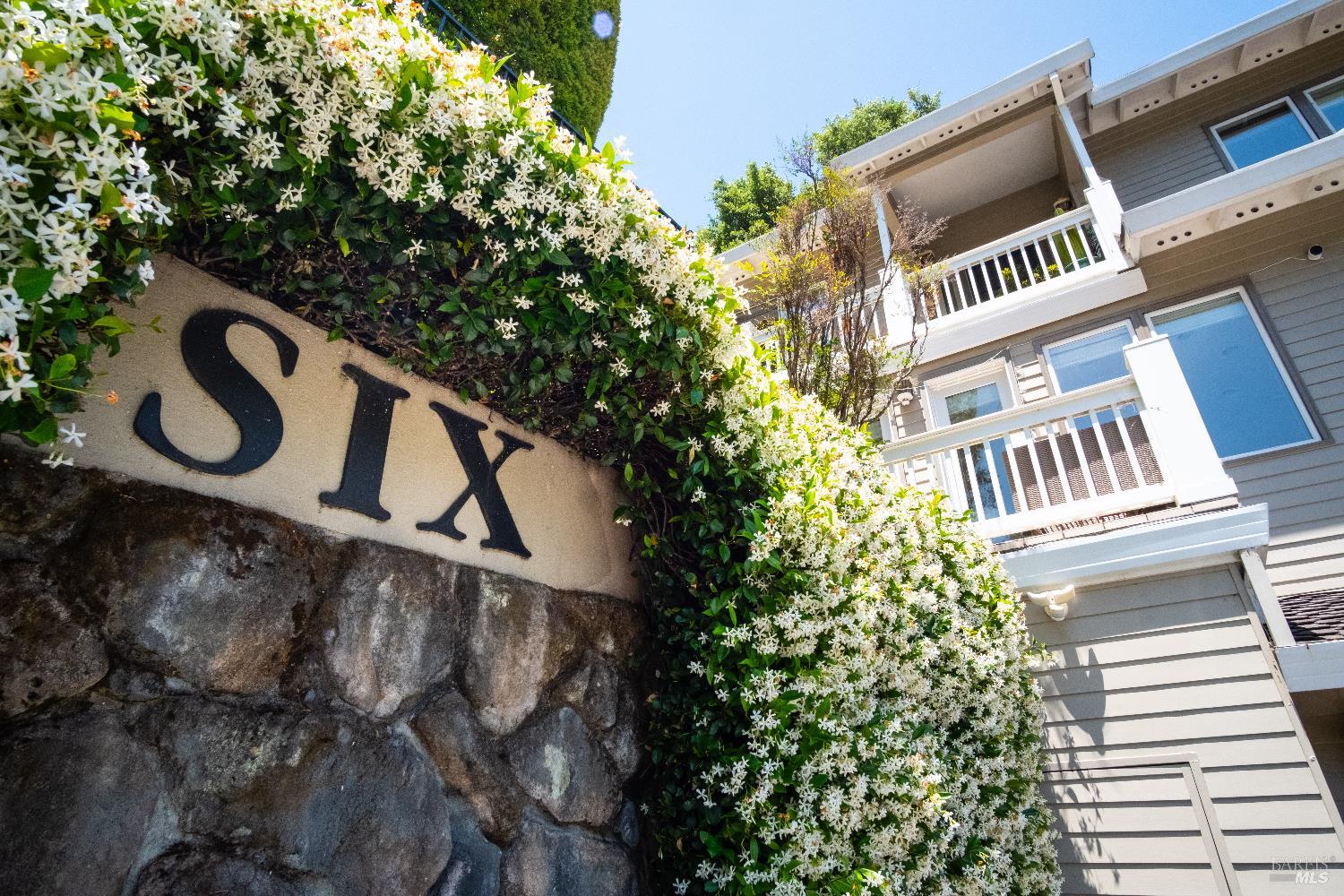 6 Oak Road Larkspur, CA 94939 - Photo 40 of 41 a blue sign that is sitting in front of a house