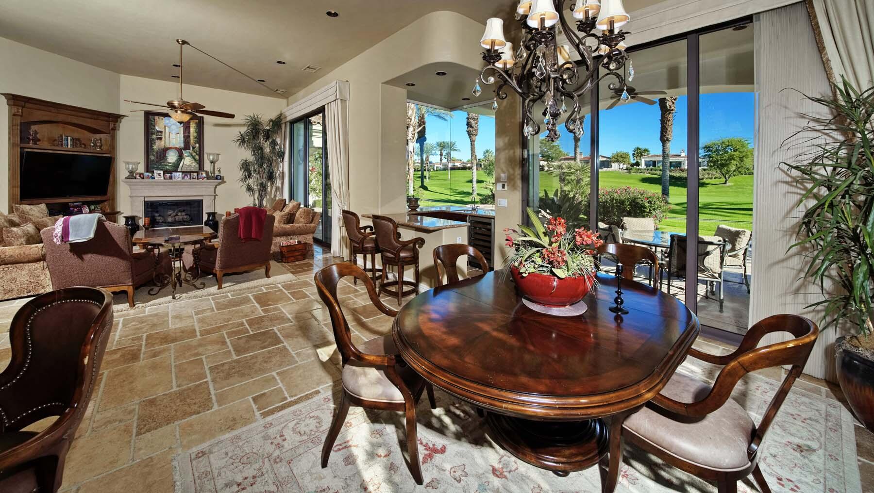 76128 Via Firenze Indian Wells, CA 92210 - Photo 15 of 67 a view of a dining room with furniture