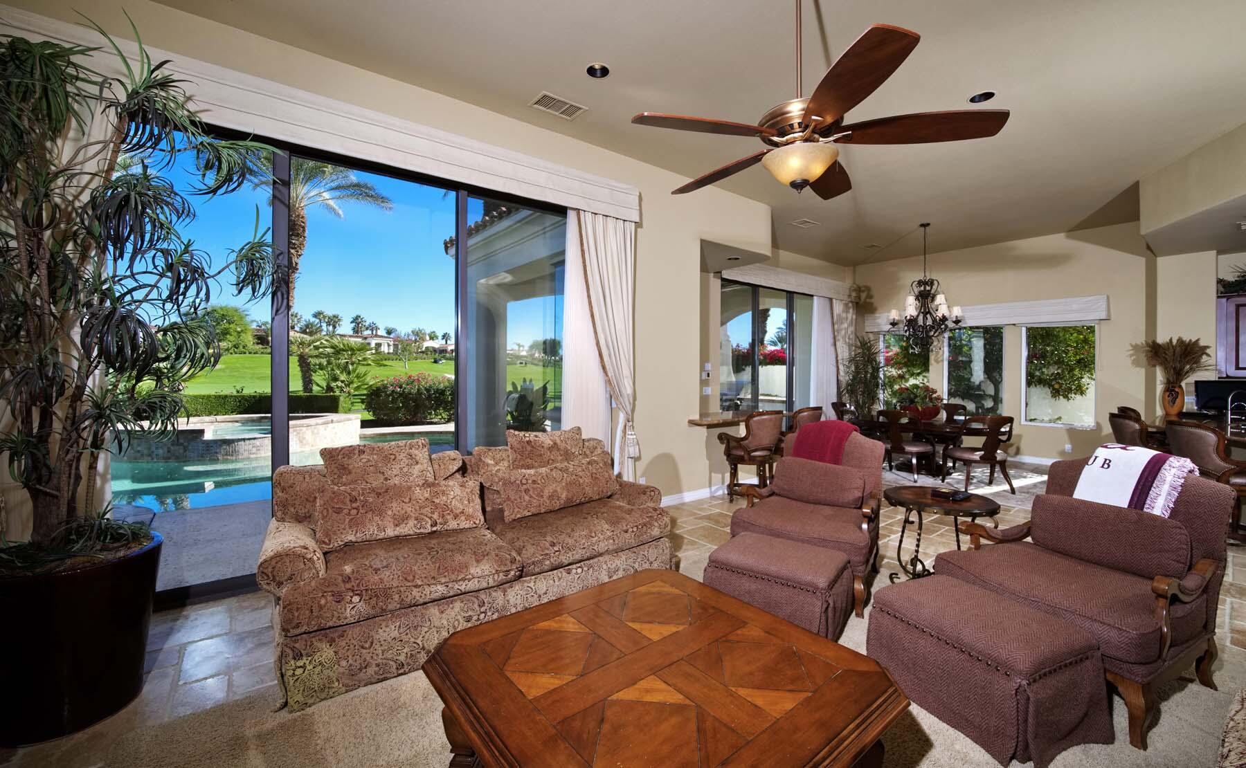 76128 Via Firenze Indian Wells, CA 92210 - Photo 17 of 67 a living room with furniture and a large window