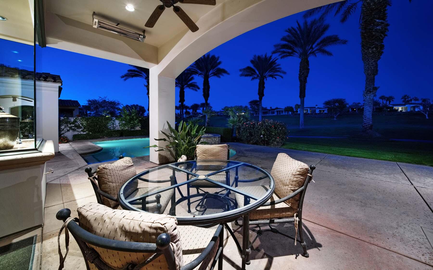 76128 Via Firenze Indian Wells, CA 92210 - Photo 20 of 67 a view of a chairs and tables in patio