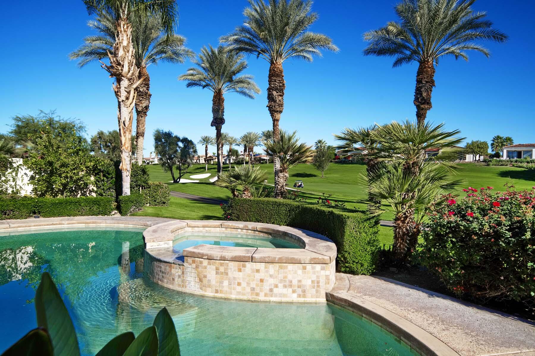 76128 Via Firenze Indian Wells, CA 92210 - Photo 27 of 67 a view of a fountain in the backyard of a house