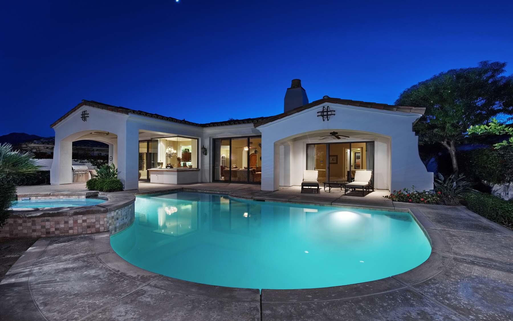 76128 Via Firenze Indian Wells, CA 92210 - Photo 34 of 67 a view of a house with swimming pool and porch with furniture