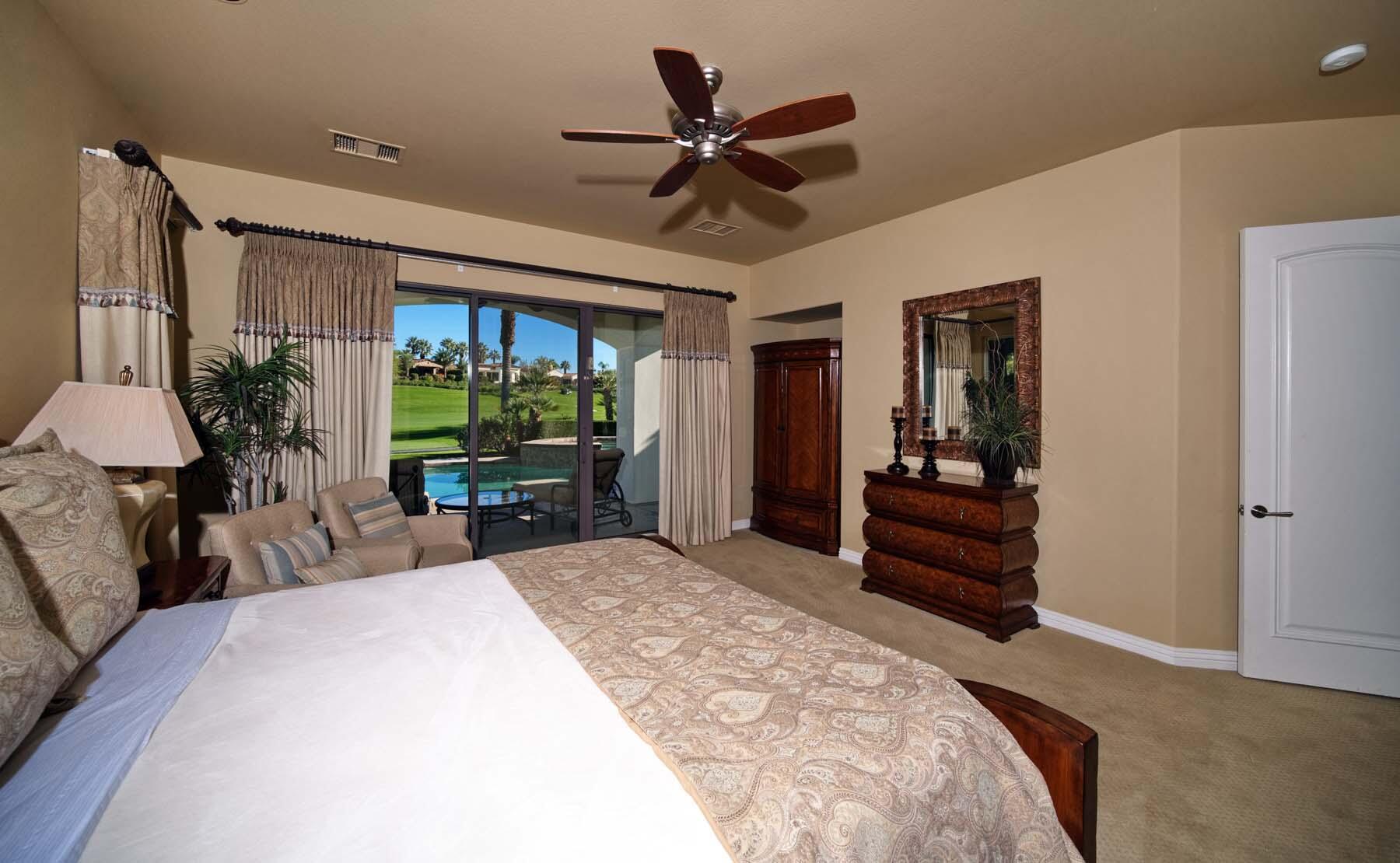 76128 Via Firenze Indian Wells, CA 92210 - Photo 45 of 67 a bed room with a bed and a television