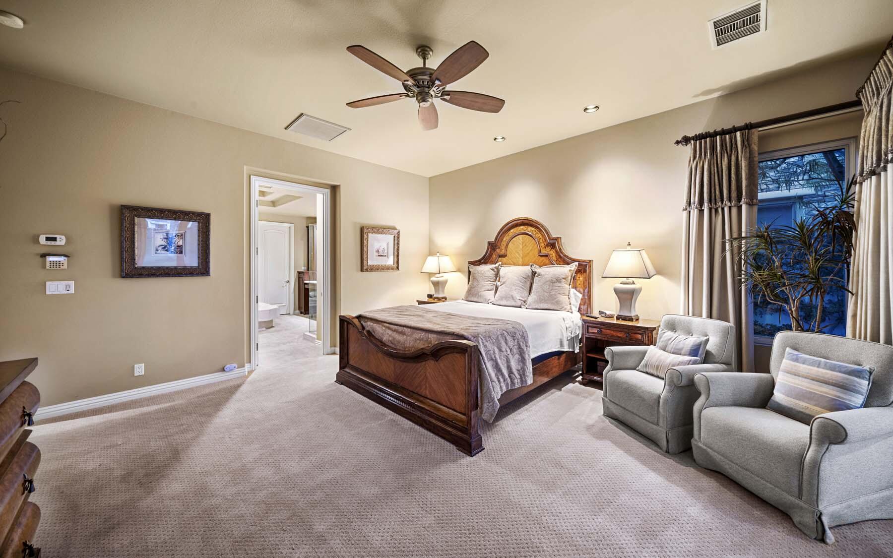 76128 Via Firenze Indian Wells, CA 92210 - Photo 47 of 67 a bedroom with a bed couch and window