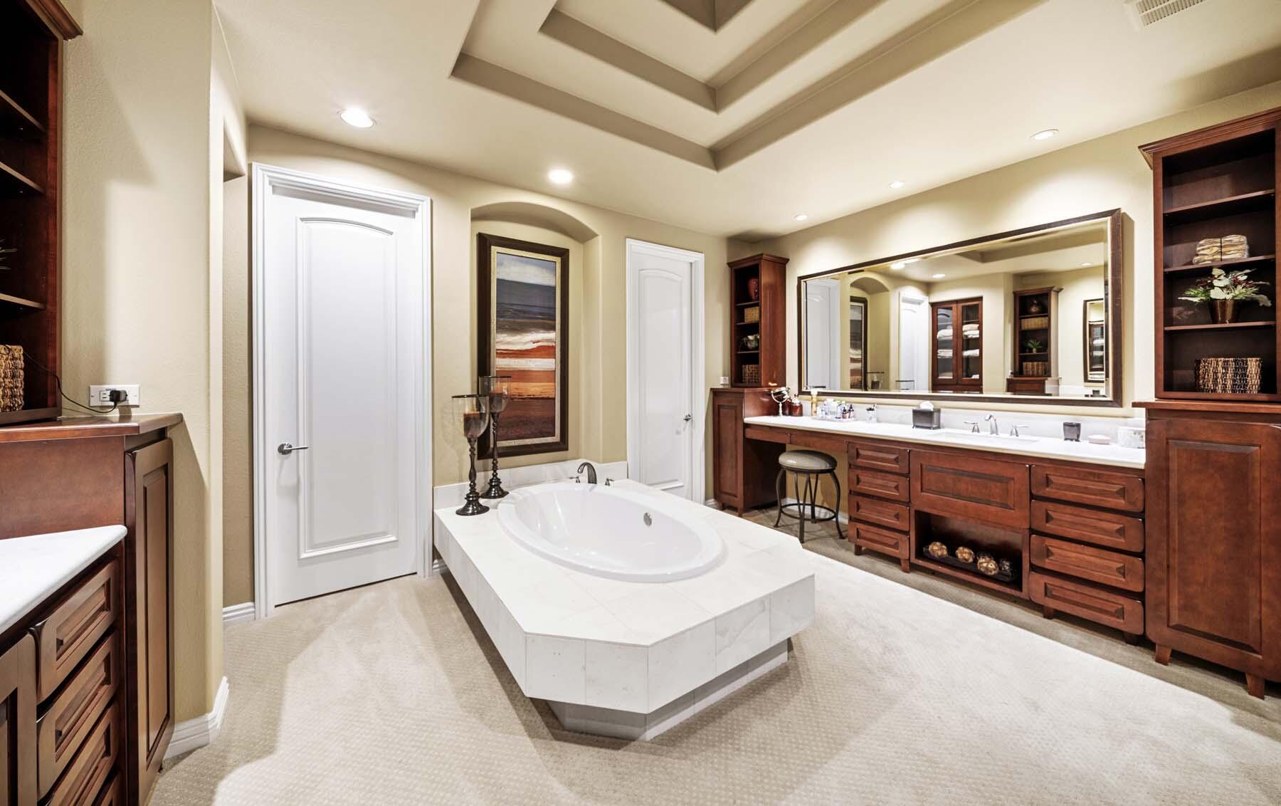 76128 Via Firenze Indian Wells, CA 92210 - Photo 49 of 67 a spacious bathroom with a tub double sink and mirror