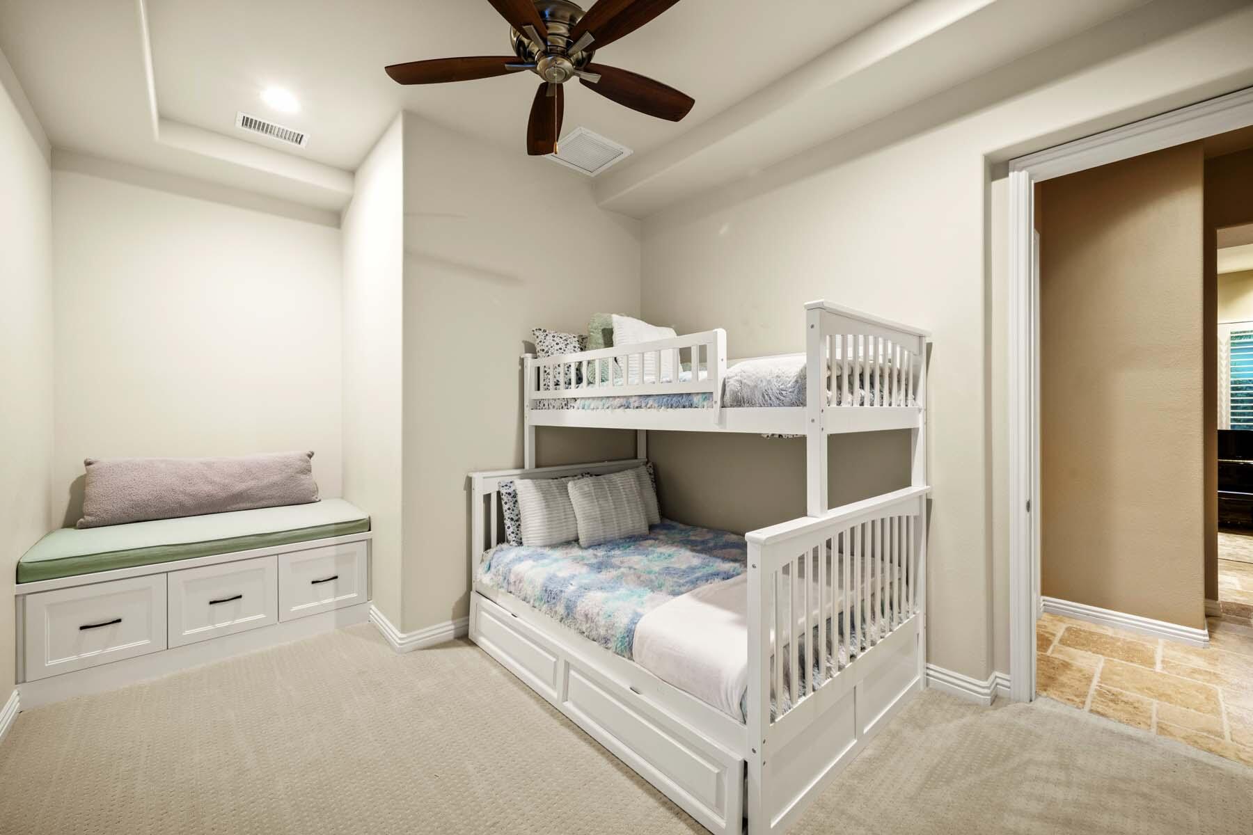 76128 Via Firenze Indian Wells, CA 92210 - Photo 59 of 67 a living room with a baby crib furniture and a window