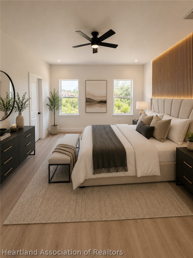 4307 Talbot Street Sebring, FL 33872 - Photo 7 of 19 a bedroom with a bed and window