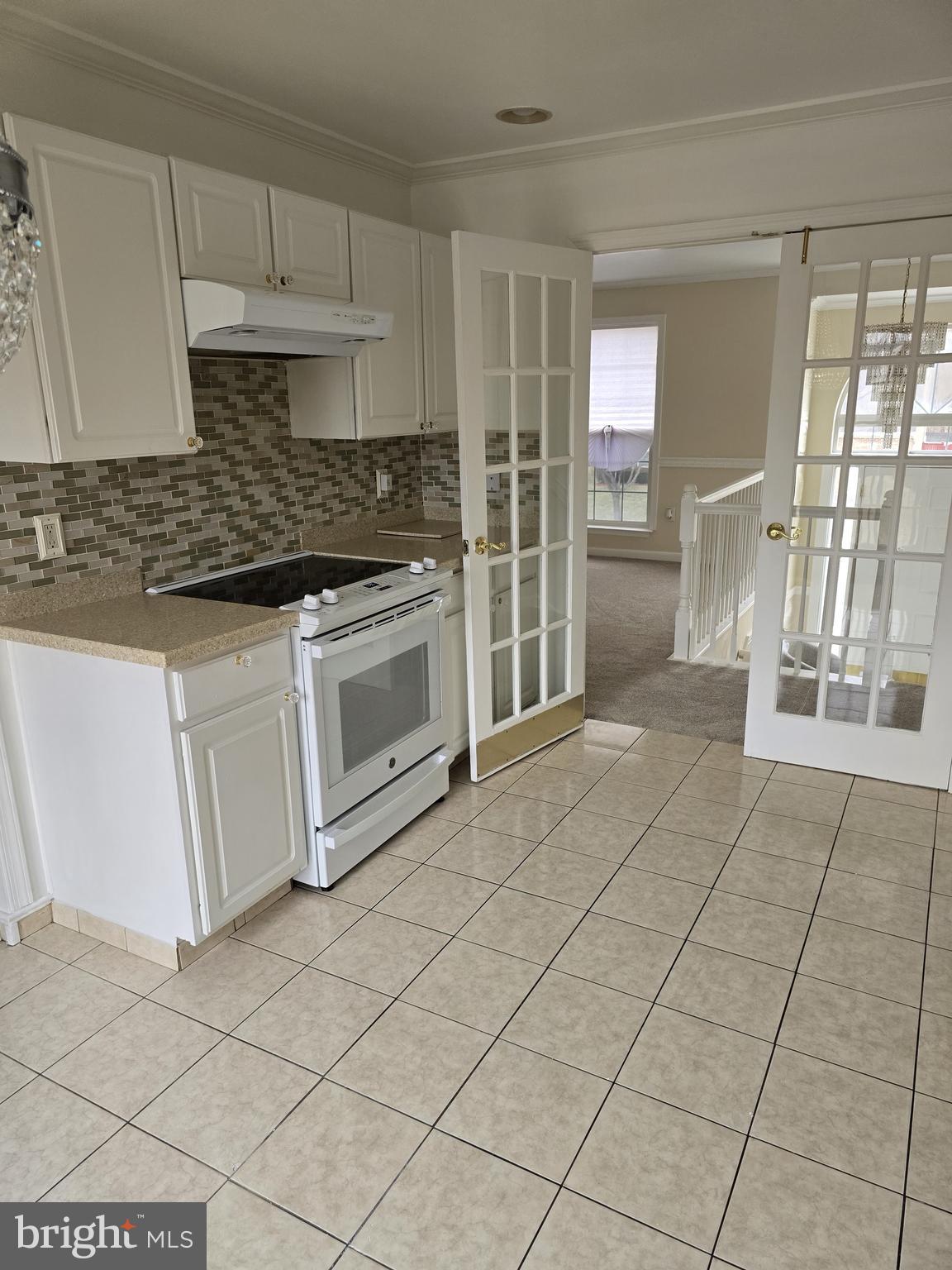 12708 Dunkirk Drive Upper Marlboro, MD 20772 - Photo 5 of 19 a kitchen with stainless steel appliances granite countertop a stove a sink and a refrigerator
