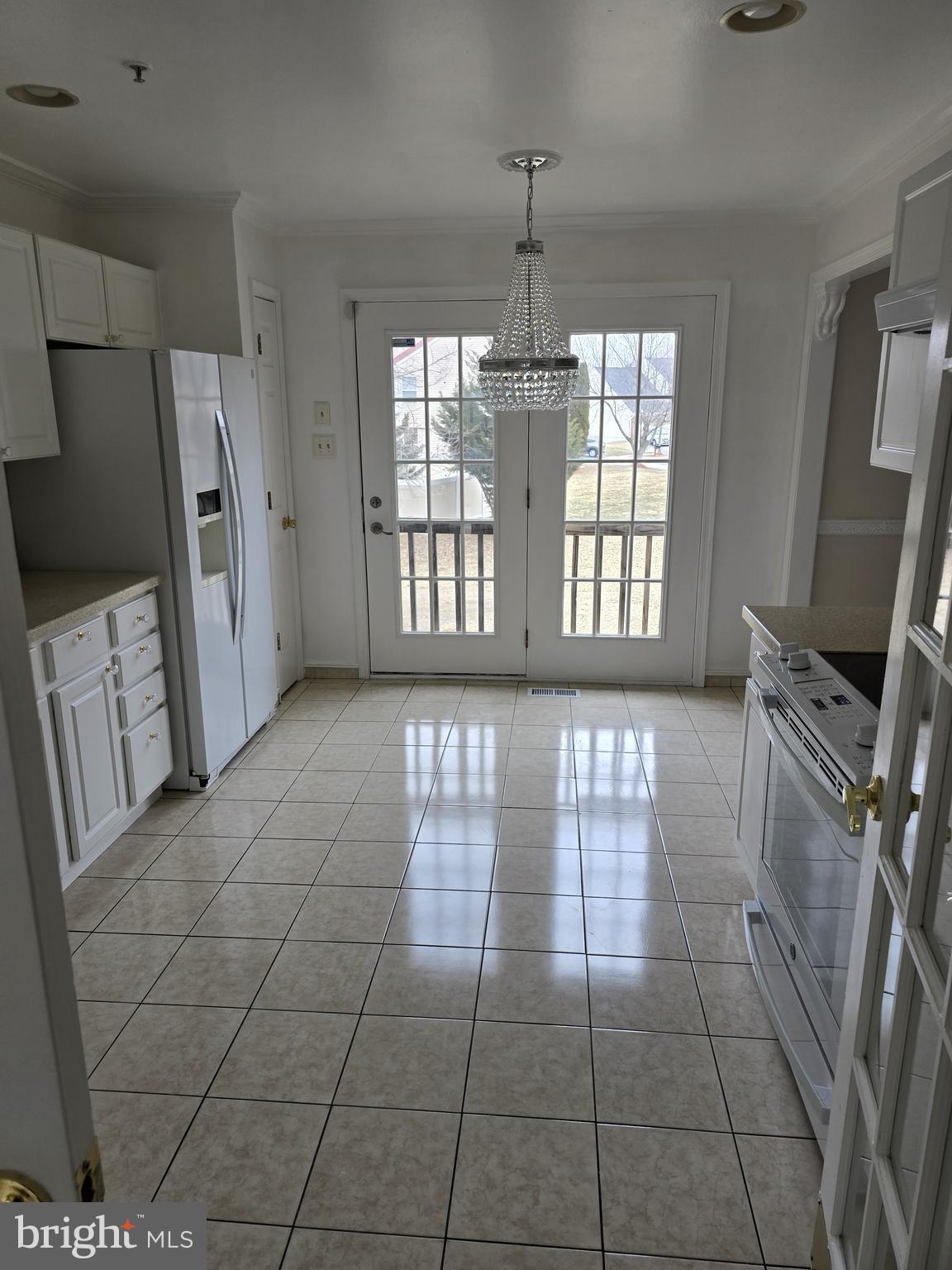 12708 Dunkirk Drive Upper Marlboro, MD 20772 - Photo 6 of 19 a view of entryway with stairs and wooden floor