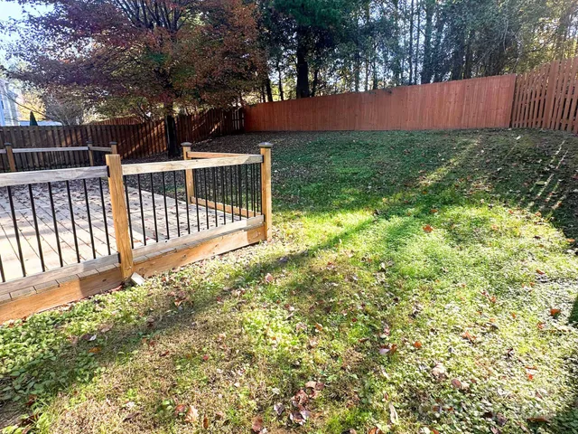 a view of backyard with green space