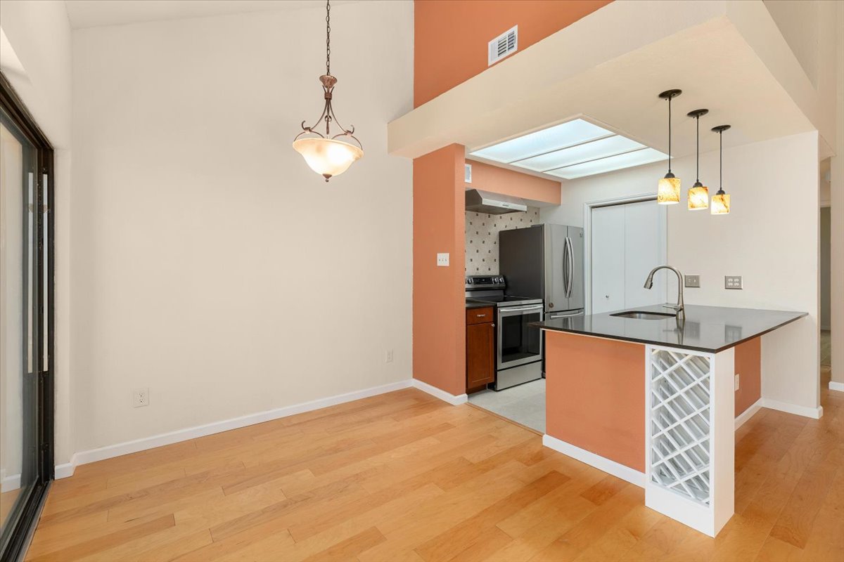 4711 Spicewood Springs Road, Unit 4222 Austin, TX 78759 - Photo 14 of 35 An open-concept living space integrates a well-appointed kitchen.