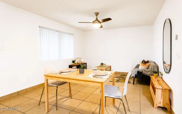 a view of a workspace with furniture