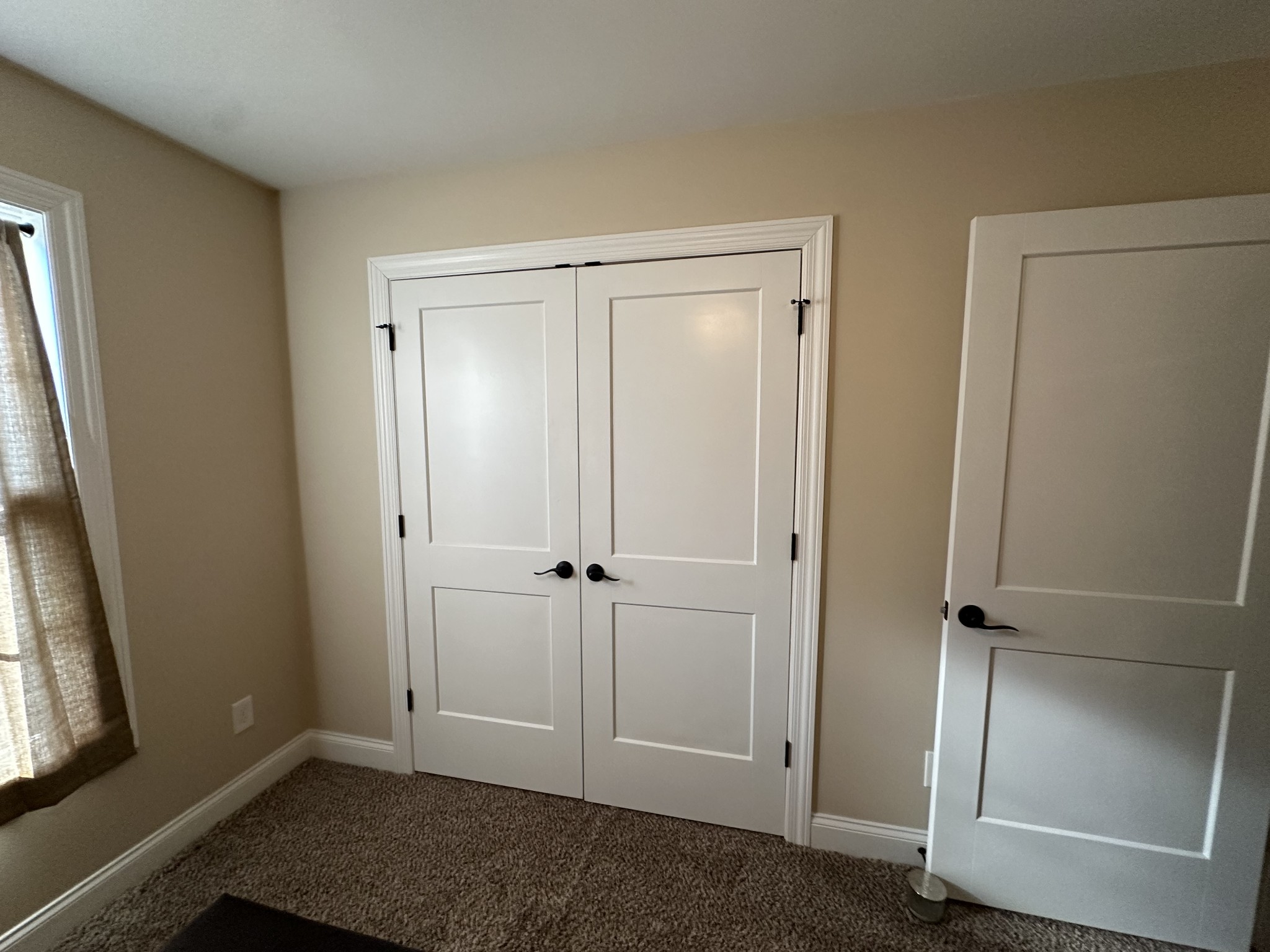 104 Lincoln Street Ethridge, TN 38456 - Photo 16 of 23 an empty room with windows and closet