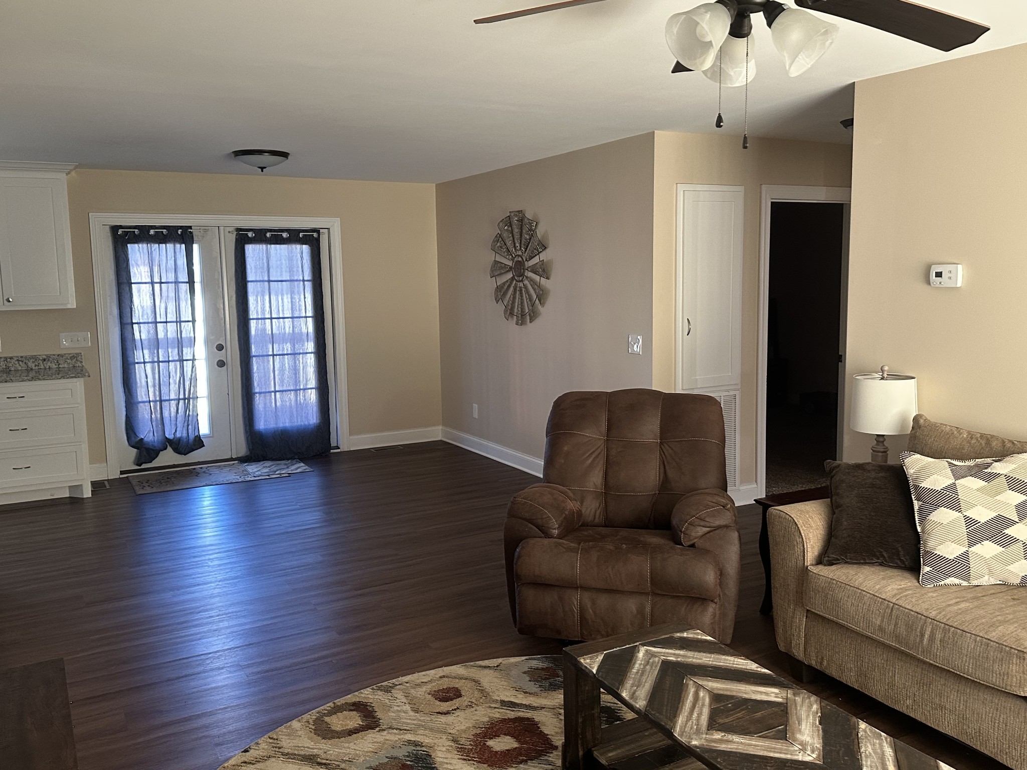 104 Lincoln Street Ethridge, TN 38456 - Photo 6 of 23 a living room with furniture and wooden floor
