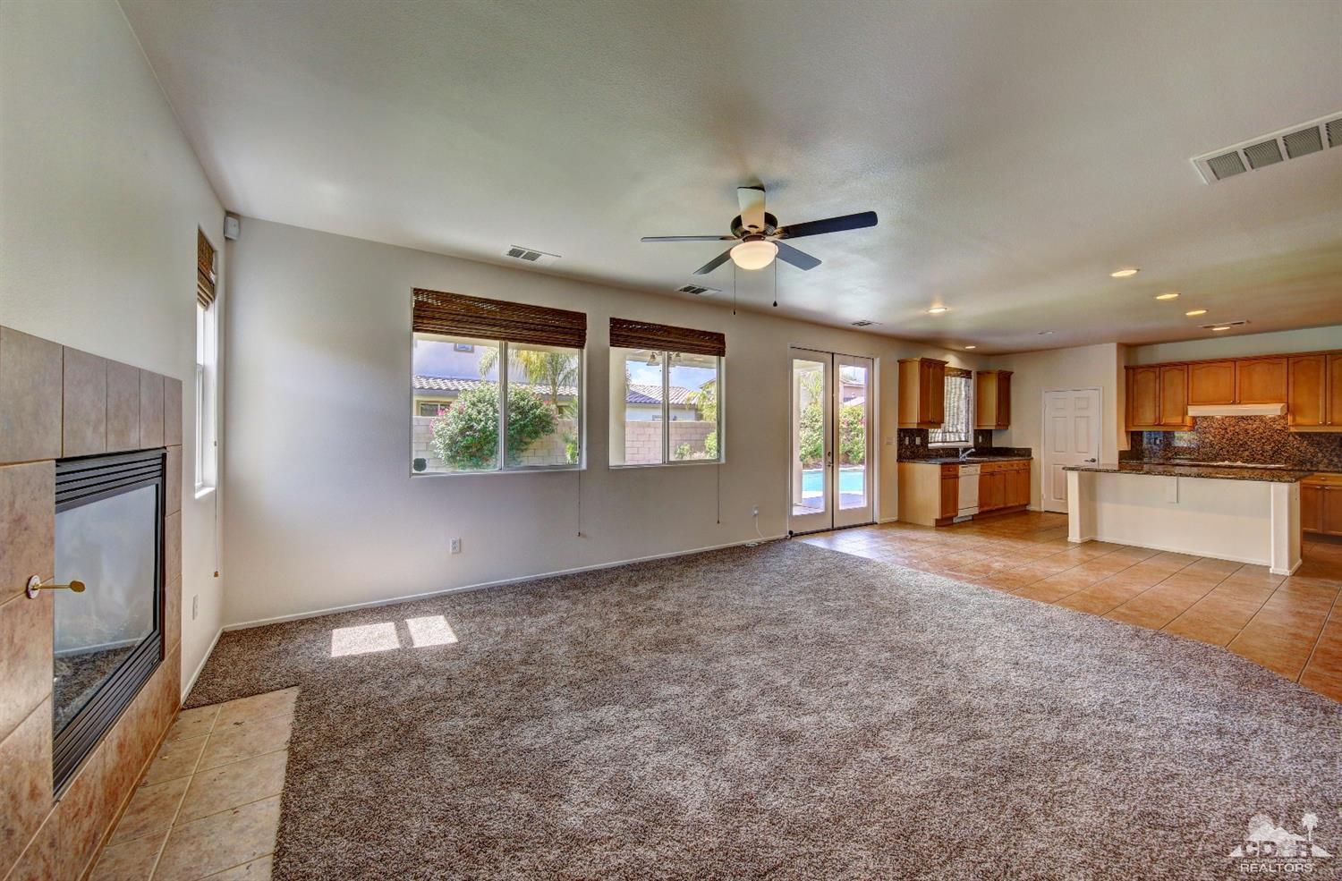 83275 Lightning Road Indio, CA 92203 - Photo 16 of 28 a view of a kitchen with a sink and a window