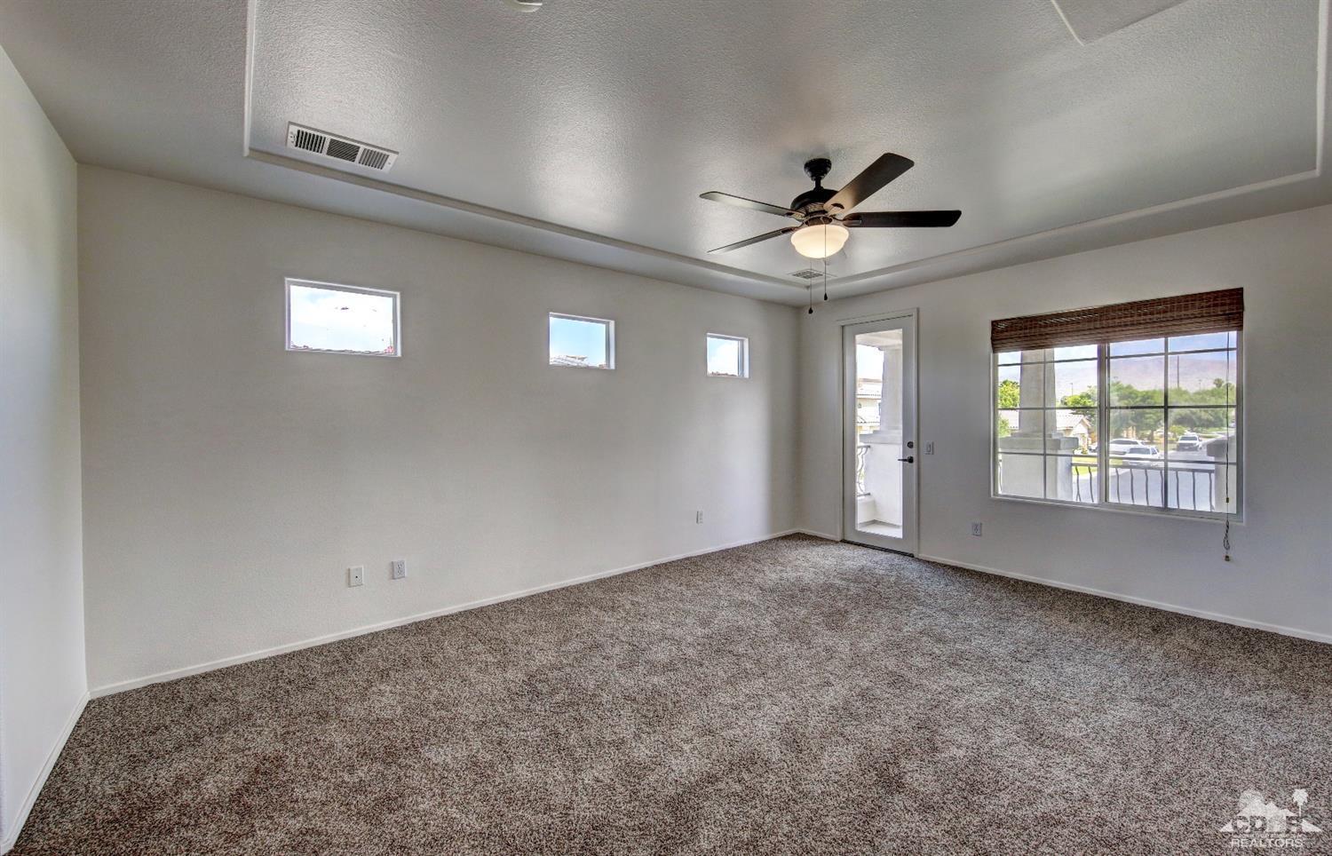 83275 Lightning Road Indio, CA 92203 - Photo 17 of 28 a view of an empty room with a window
