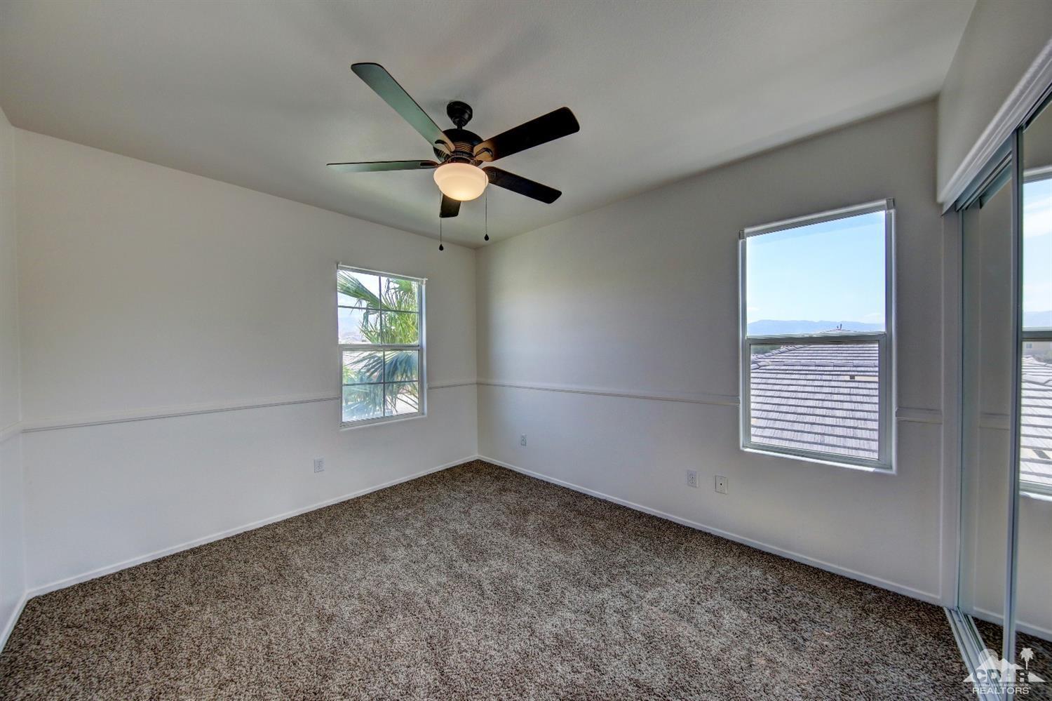 83275 Lightning Road Indio, CA 92203 - Photo 20 of 28 a view of an empty room with a window
