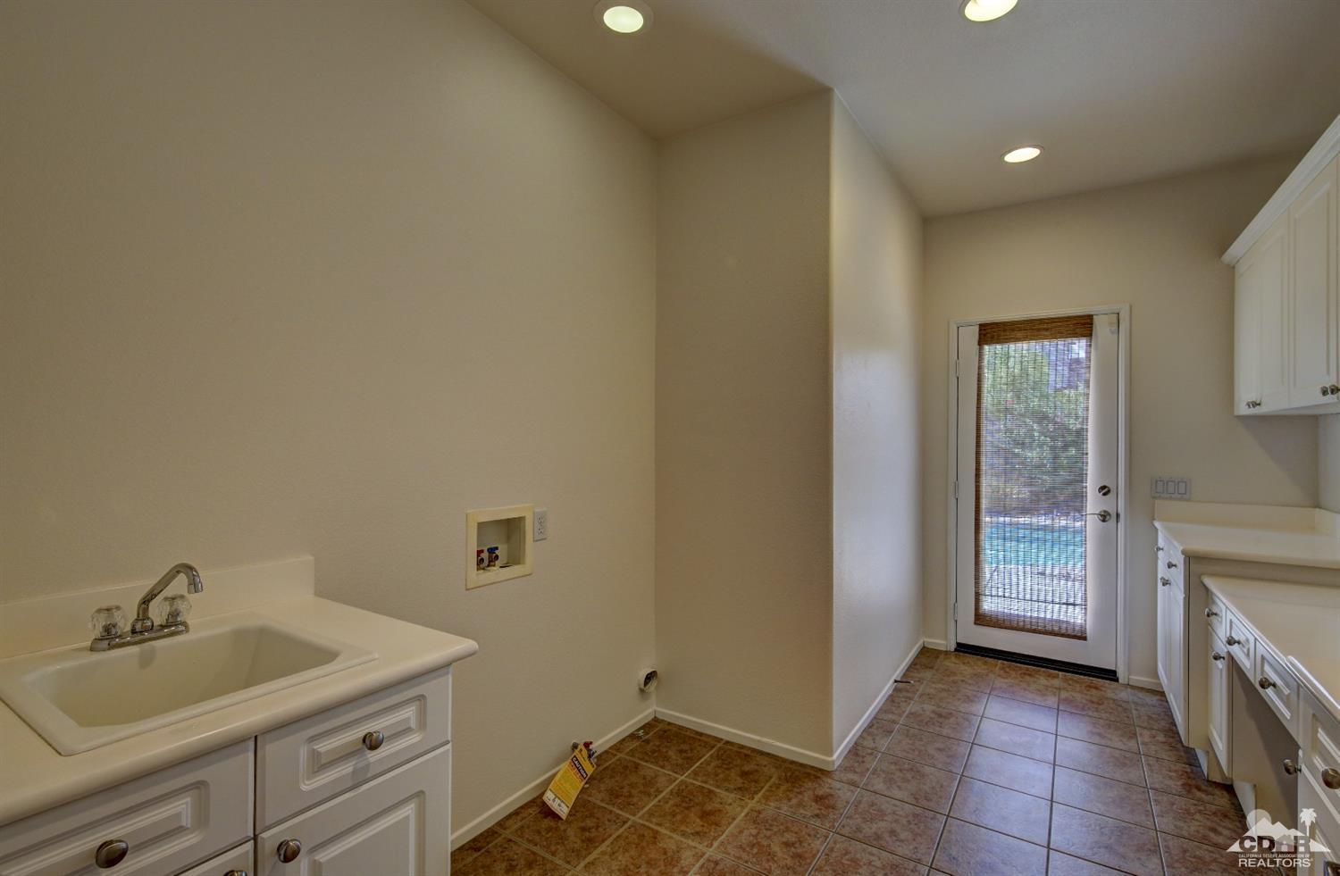 83275 Lightning Road Indio, CA 92203 - Photo 25 of 28 a bathroom with a sink and a mirror
