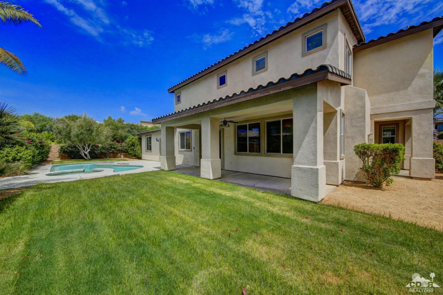 83275 Lightning Road Indio, CA 92203 - Photo 6 of 28 a front view of a house with a yard