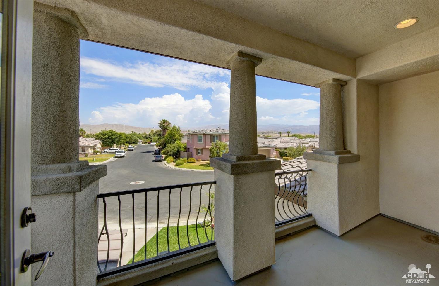 83275 Lightning Road Indio, CA 92203 - Photo 7 of 28 a view of a balcony with city view
