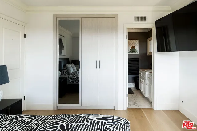 a view of a bedroom from a hallway