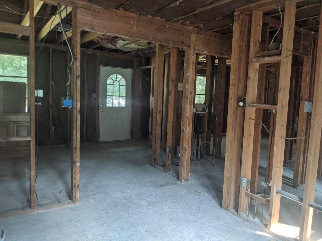 380 Perry Road Woodbine, NJ 08270 - Photo 4 of 19 a view of a hallway with wooden shelves