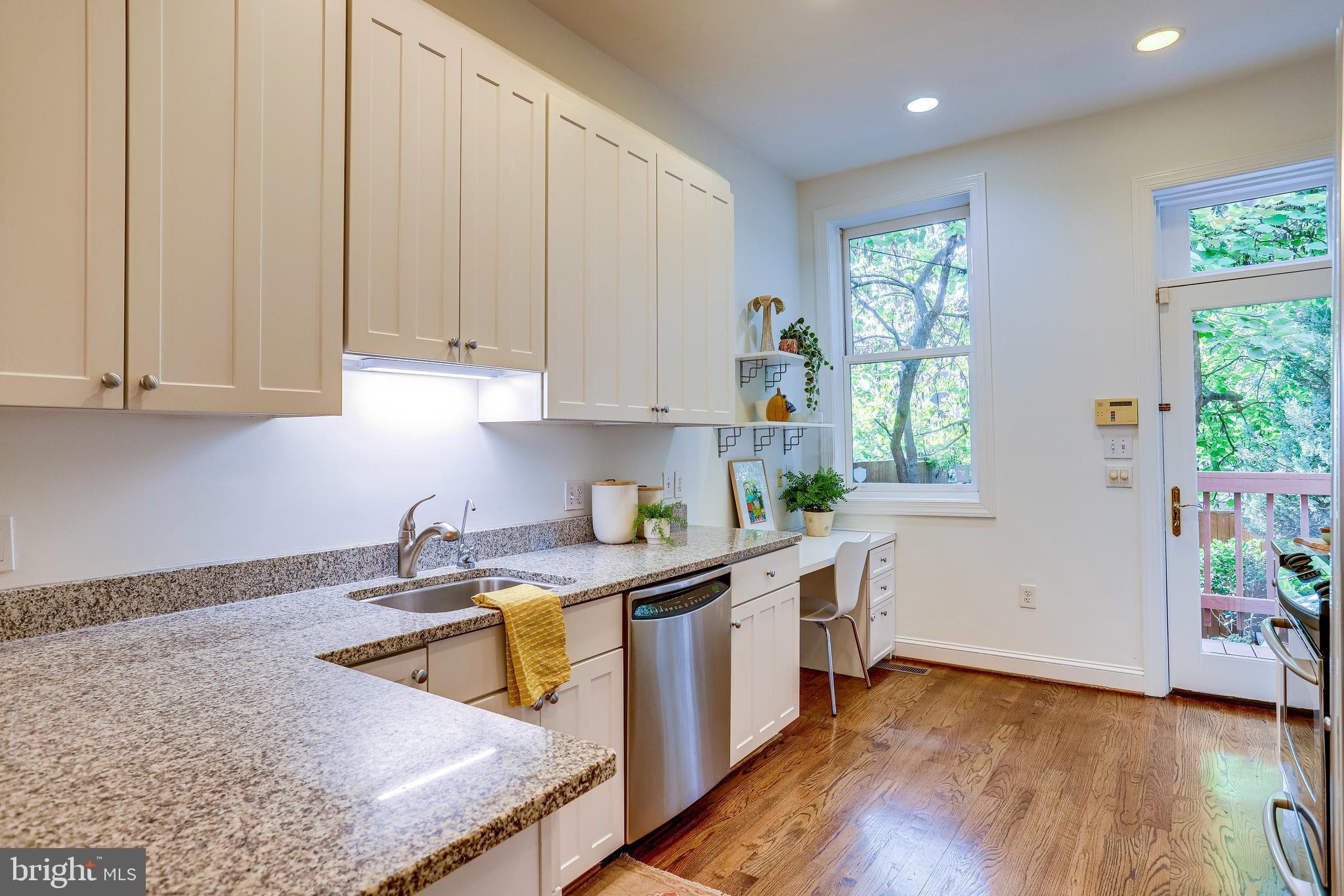143 E Street Southeast Washington, DC 20003 - Photo 15 of 59 Oodles of granite counters, copious cabinets