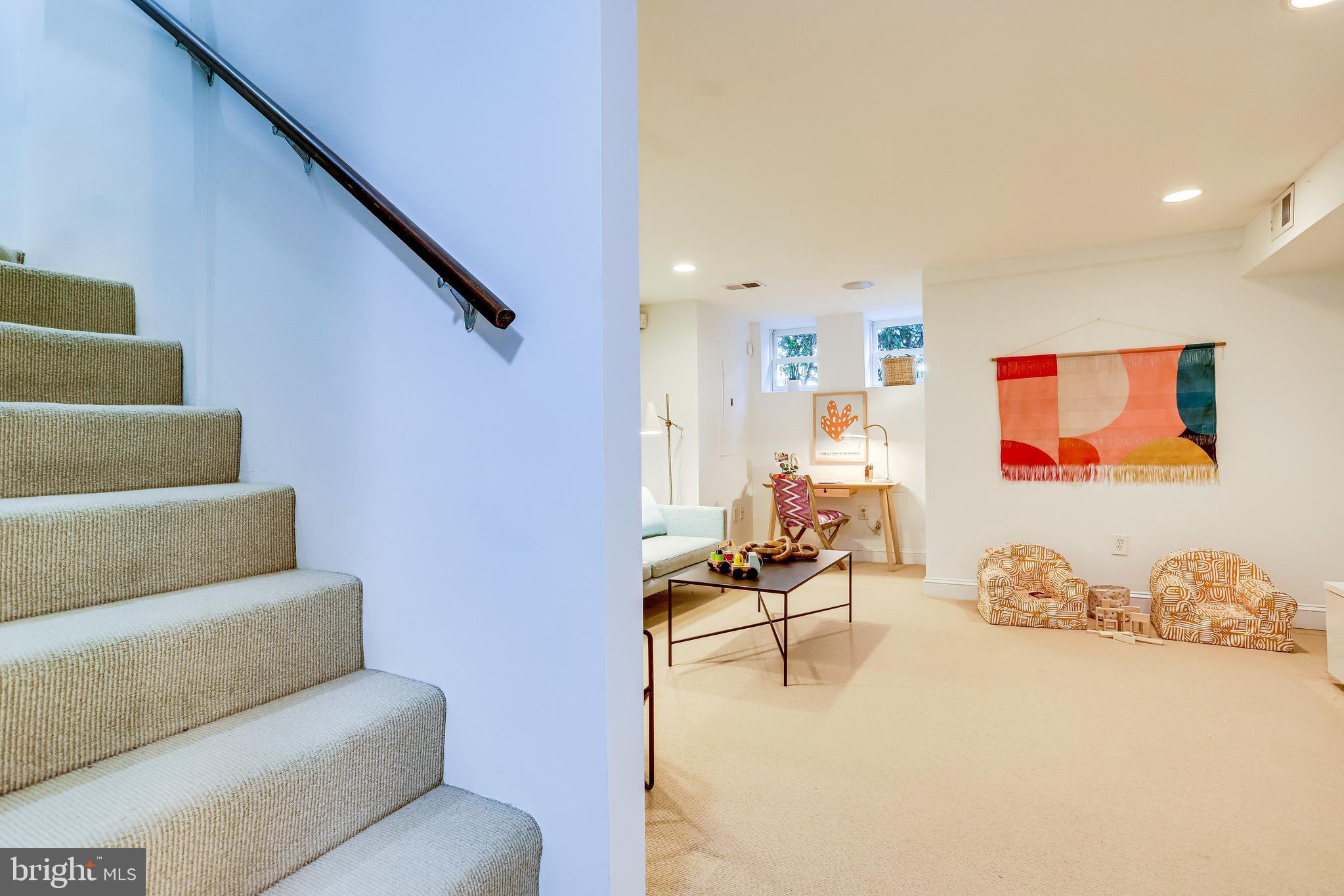 143 E Street Southeast Washington, DC 20003 - Photo 35 of 59 Stairs to flexible lower level w/TALL ceilings