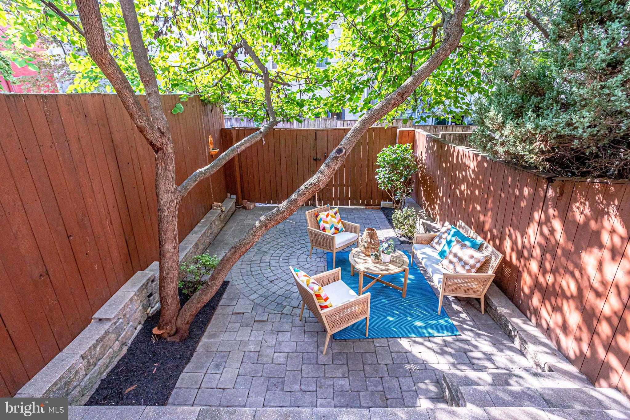 143 E Street Southeast Washington, DC 20003 - Photo 45 of 59 Flexi pleasant rear patio shaded by trees