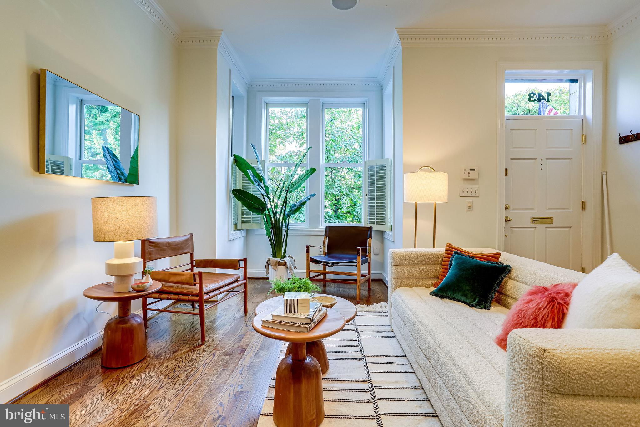 143 E Street Southeast Washington, DC 20003 - Photo 7 of 59 Spacious living room looking to bright bay