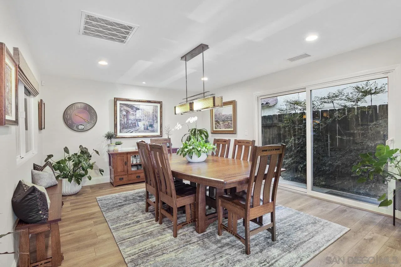 1353 Eastside Road El Cajon, CA 92020 - Photo 15 of 43 a view of a dining room with furniture window and wooden floor