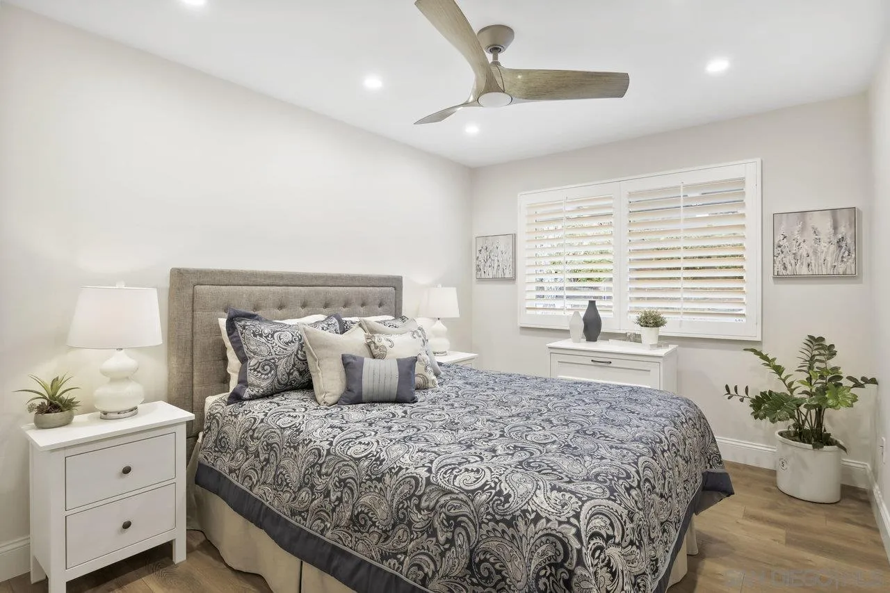 1353 Eastside Road El Cajon, CA 92020 - Photo 24 of 43 a bedroom with a large bed and a window