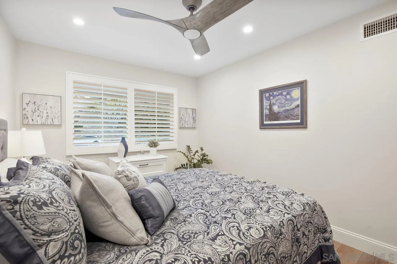 1353 Eastside Road El Cajon, CA 92020 - Photo 25 of 43 a bedroom with a bed and a couch