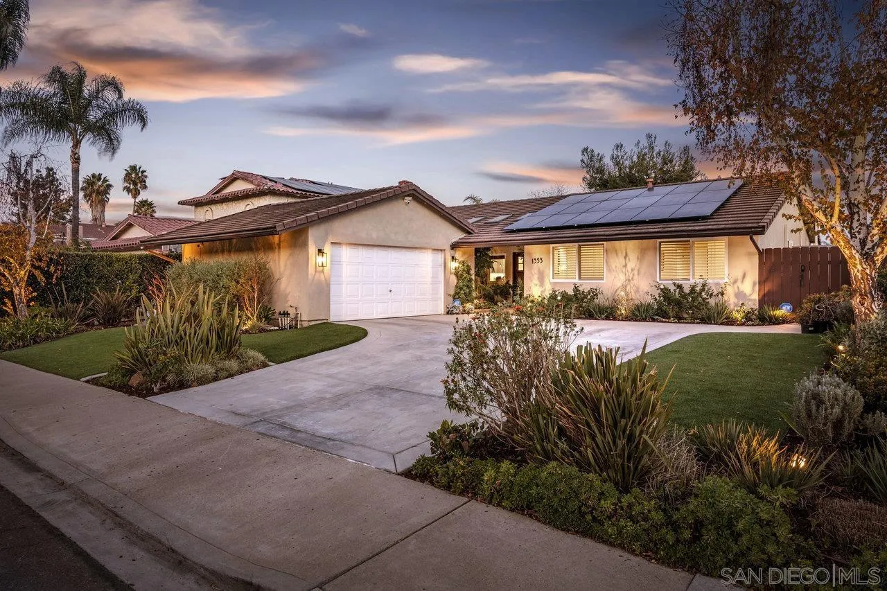 1353 Eastside Road El Cajon, CA 92020 - Photo 41 of 43 a view of a house with a small yard and floor to ceiling window
