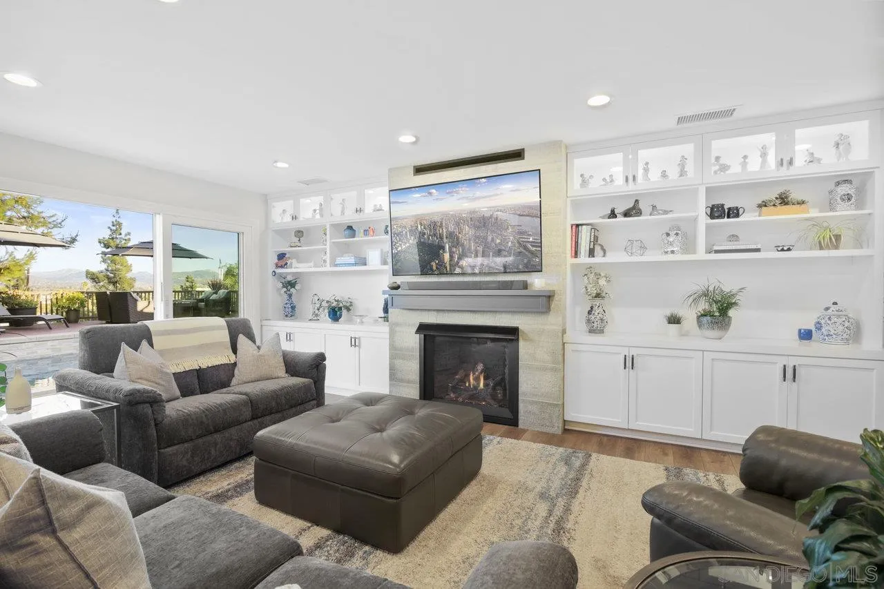1353 Eastside Road El Cajon, CA 92020 - Photo 6 of 43 a living room with furniture and a fireplace