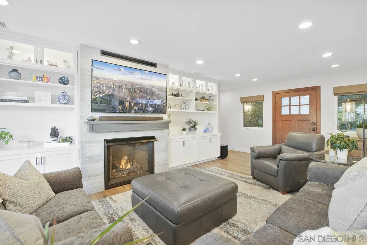 1353 Eastside Road El Cajon, CA 92020 - Photo 8 of 43 a living room with furniture and a fireplace