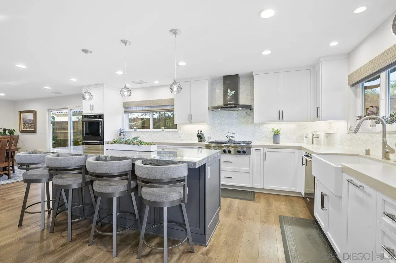1353 Eastside Road El Cajon, CA 92020 - Photo 9 of 43 a kitchen with appliances a sink and cabinets