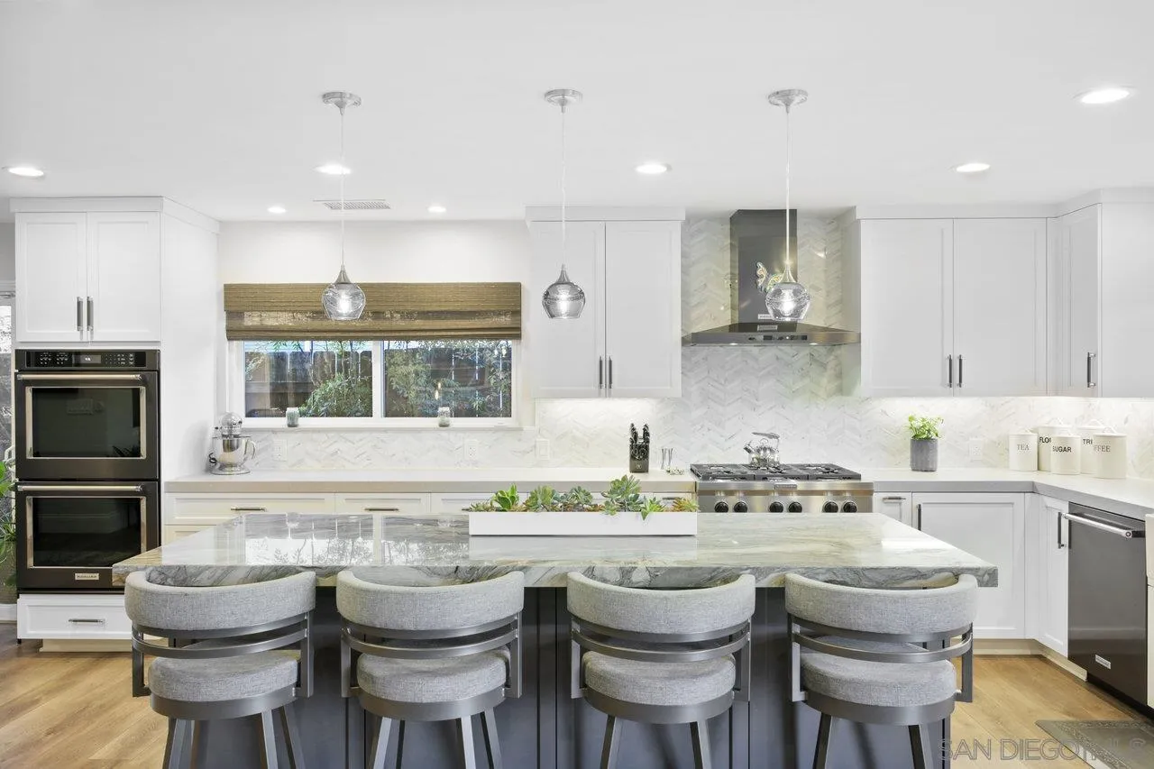 1353 Eastside Road El Cajon, CA 92020 - Photo 10 of 43 a kitchen with a table and chairs in it